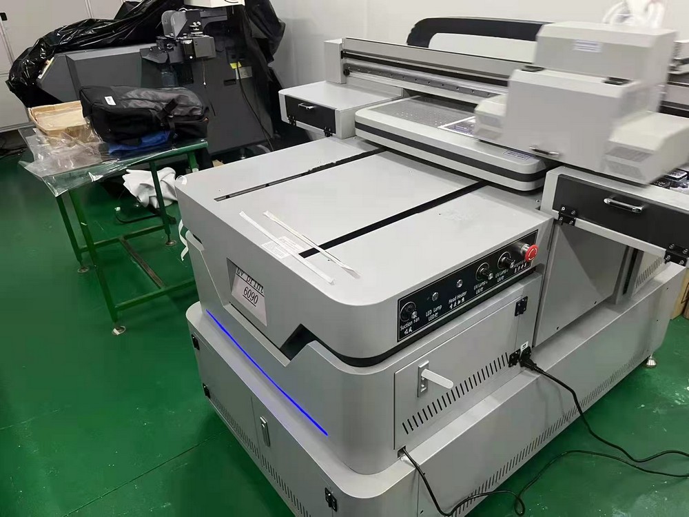 AMO 6090 UV FLATBED PRINTER AMO 6090 UV FLATBED PRINTER