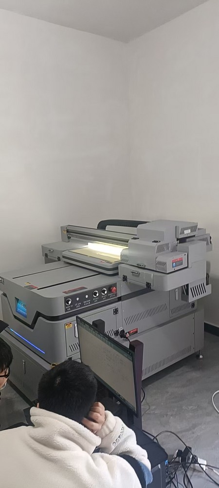 AMO 6090 UV FLATBED PRINTER AMO 6090 UV FLATBED PRINTER